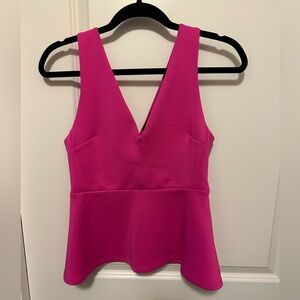 Dynamite Fuchsia V-Neck Peplum Tank Top. Flattering